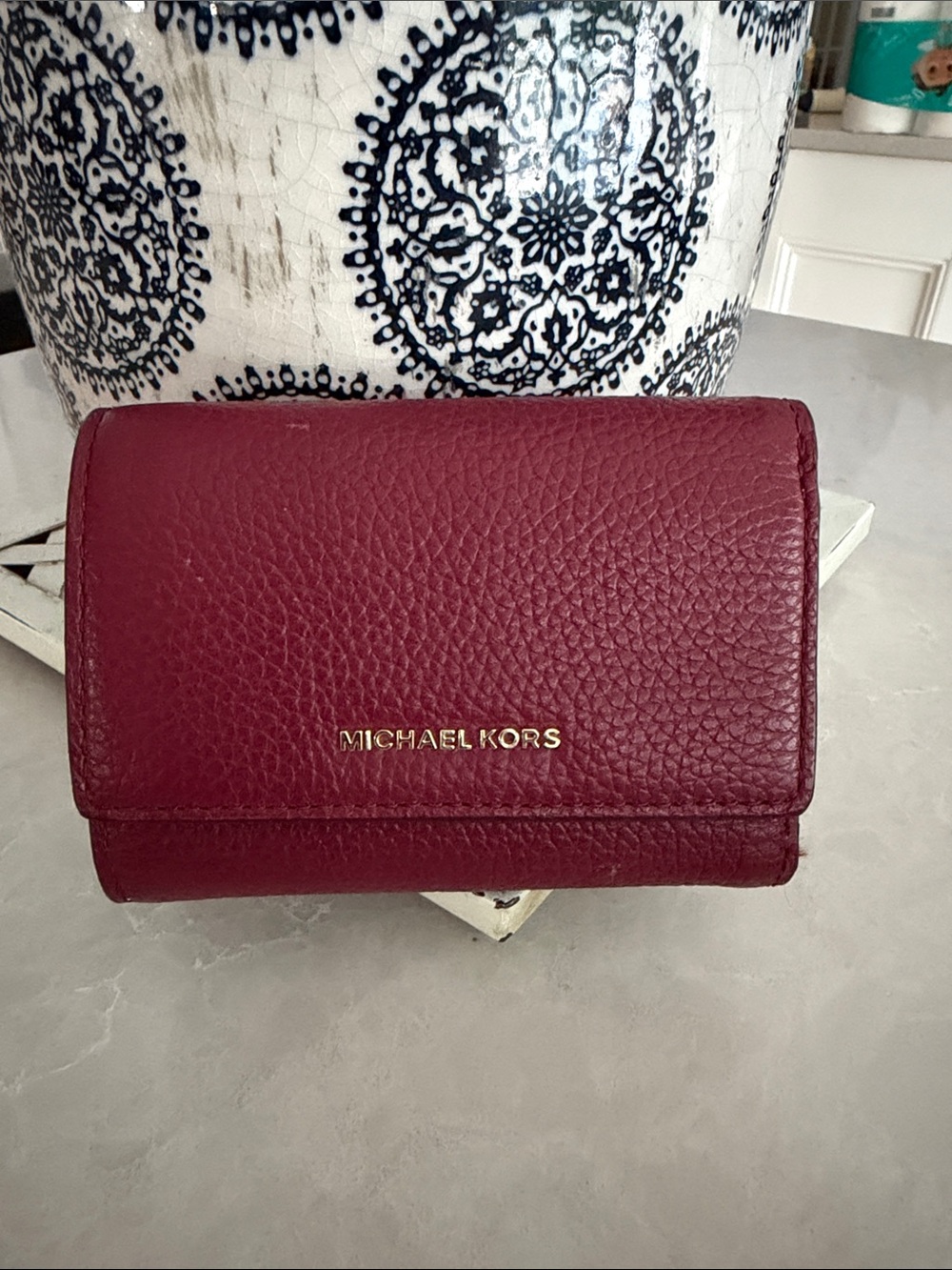 Michael Kors Compact Burgundy pebbled Leather Wallet with Gold Hardware
